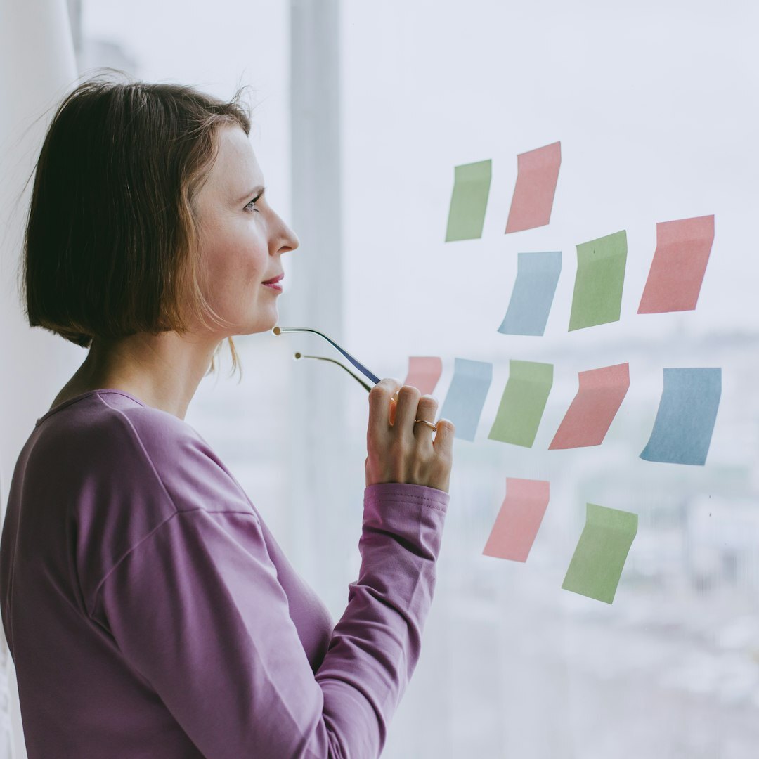 Portrait of a Flemish Belgian woman in her thirties as data analyst