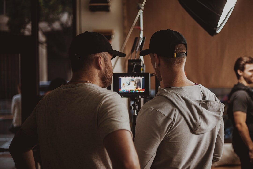 Behind the scenes of a live business show recording with crew